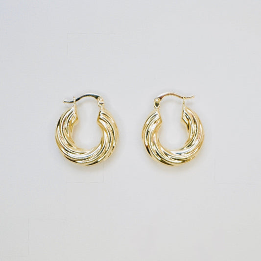Very stylish and elegant, these hoop earrings are crafted in highly polished 14K yellow gold. These earrings are the perfect mix of stylish and chic, amazing for every day wear. 
A pair weighs 3.2 grams 
Measures 20mm diameter
FREE USPS Priority Mail shipping!
FREE leatherette jewelry box!
Made in Italy. 