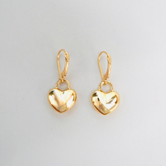 Very stylish and elegant, these heart earrings are crafted in highly polished 14K yellow gold. These earrings are the perfect mix of stylish, amazing for every day wear. 
A pair weighs 2 grams 
One earring measures 1 inch long.
FREE USPS Priority Mail shipping!
FREE leatherette jewelry box!