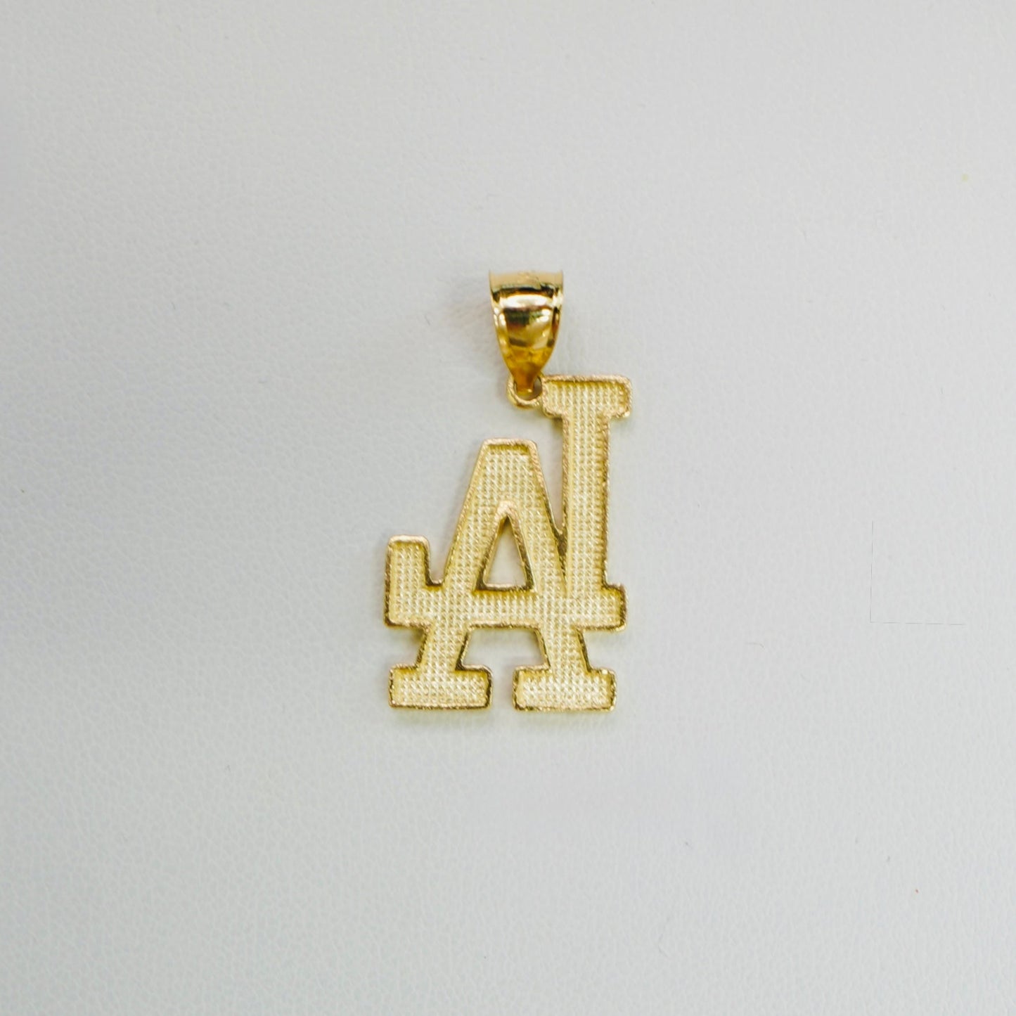 Solid 14K Diamond Cut LA Pendant